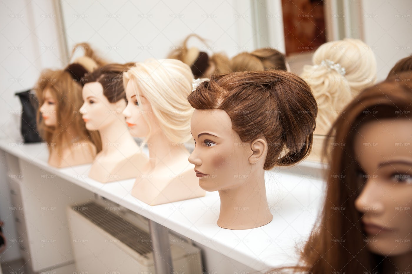 Cosmotology School Mannequins: Stock Photos