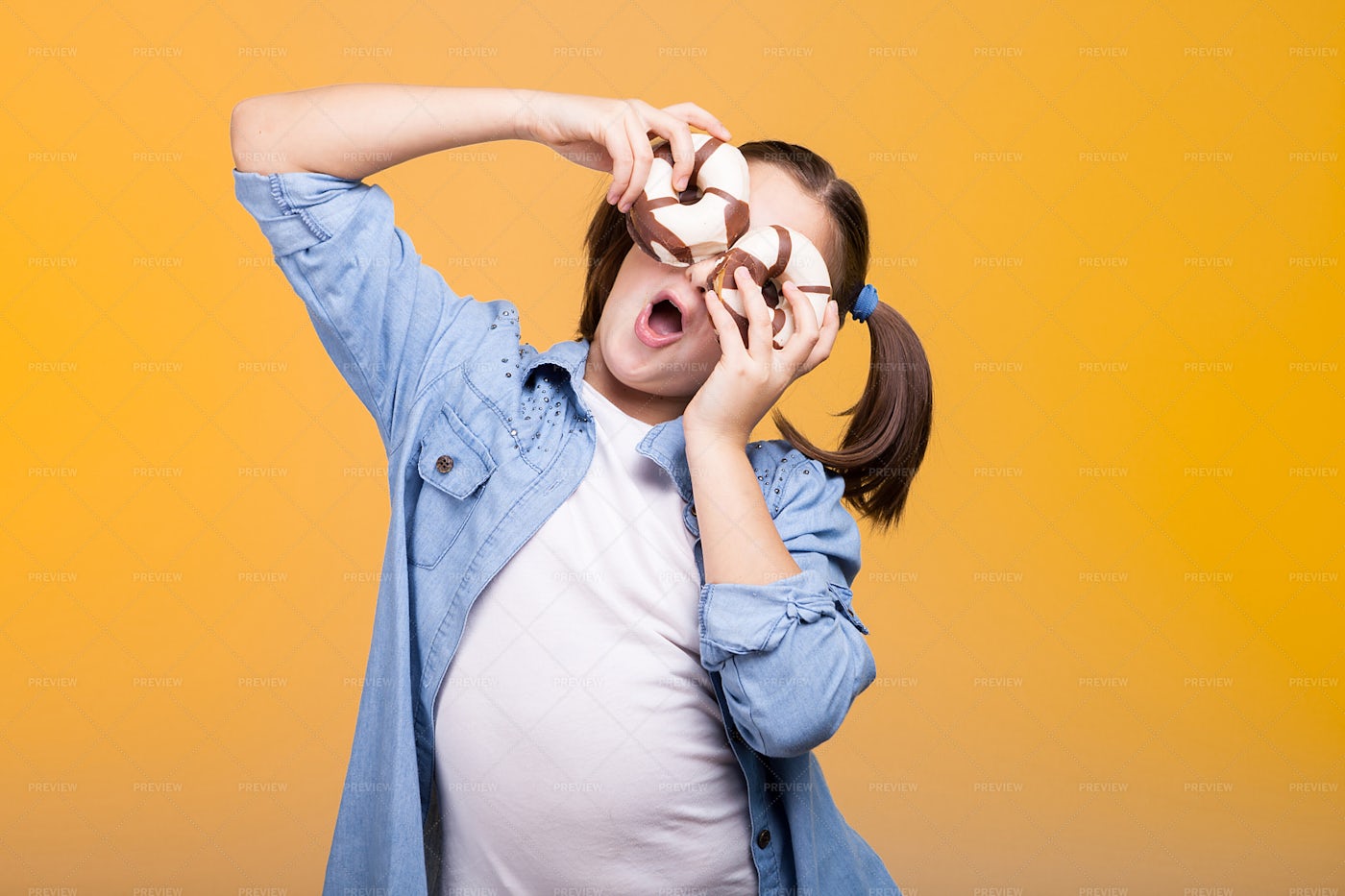 Playing With Donuts: Stock Photos