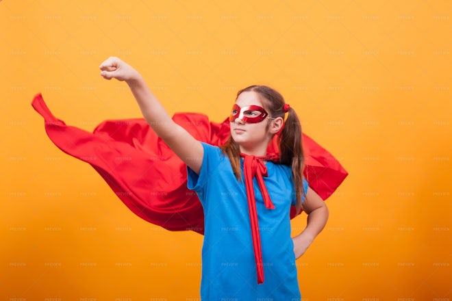 Little Girl Plays Superhero - Stock Photos | Motion Array