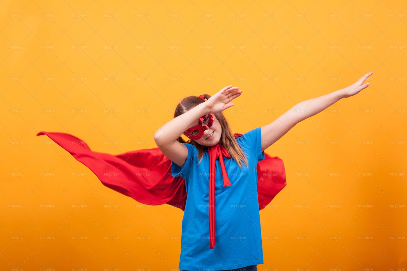 Girl Dabbing In Costume: Stock Photos