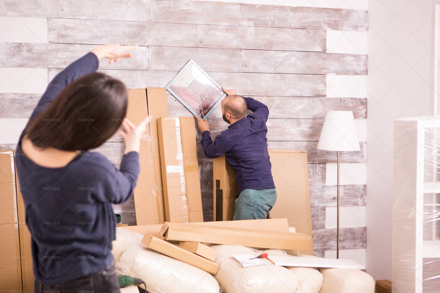 Hanging Picture On The Wall: Stock Photos
