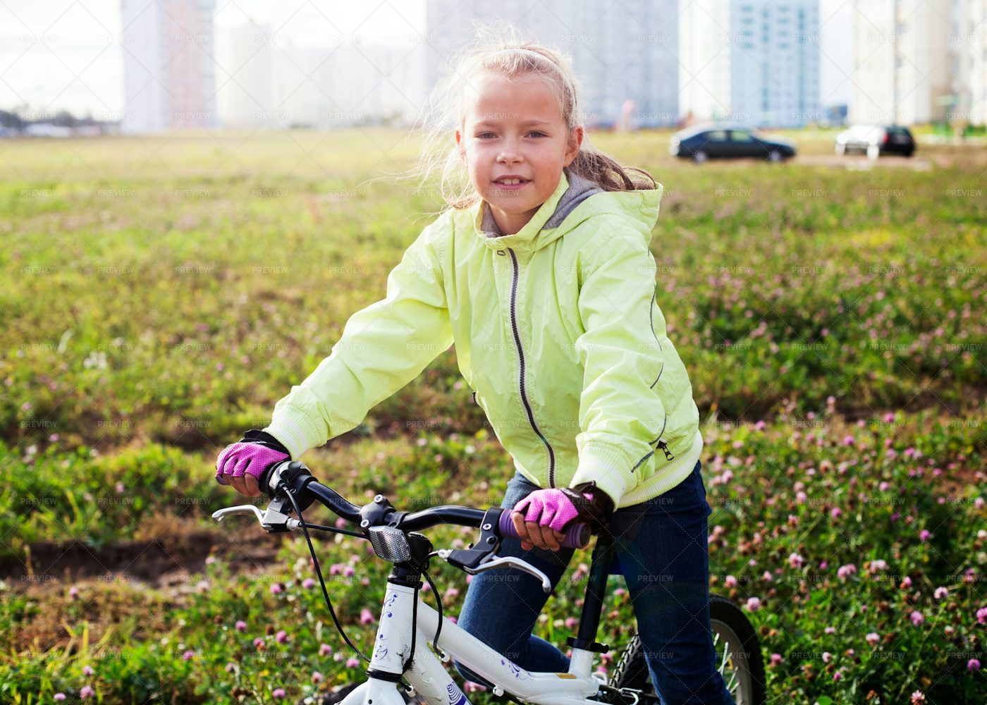 Riding Bike On Green Field: Stock Photos