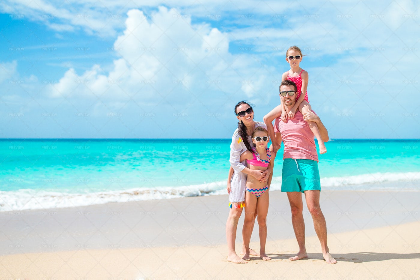 Family Pose On Caribbean Beach: Stock Photos