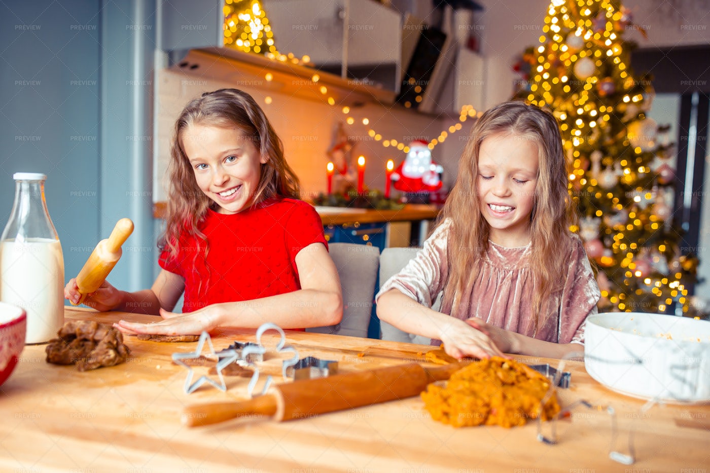 Little Girls Making Gingerbreads: Stock Photos