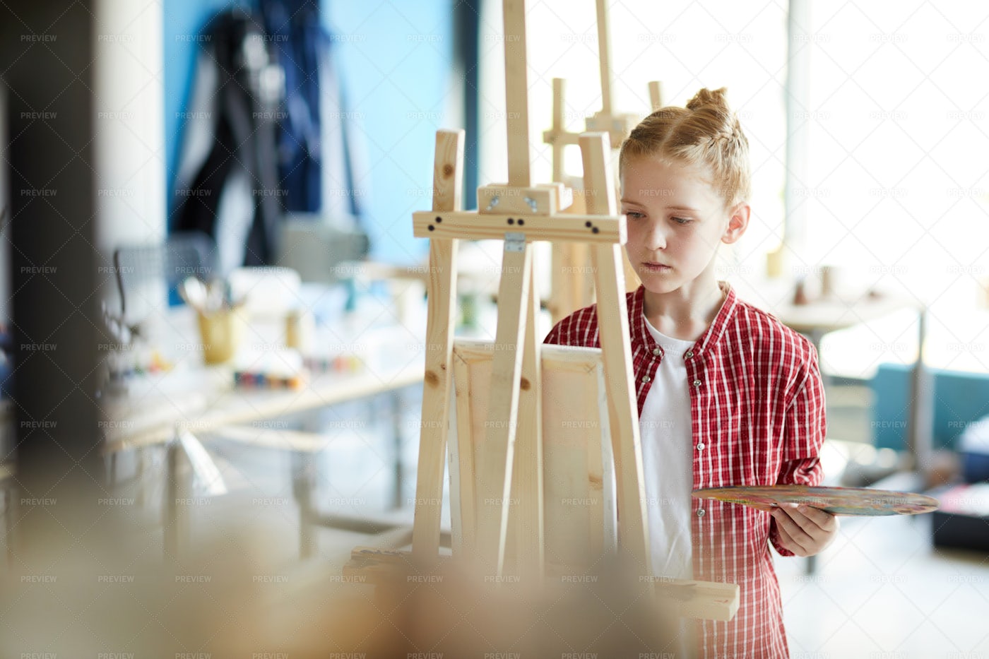Girl In Front Of Easel: Stock Photos