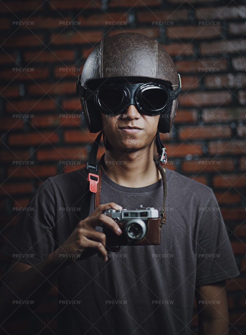 Scooter Rider With Film Camera: Stock Photos