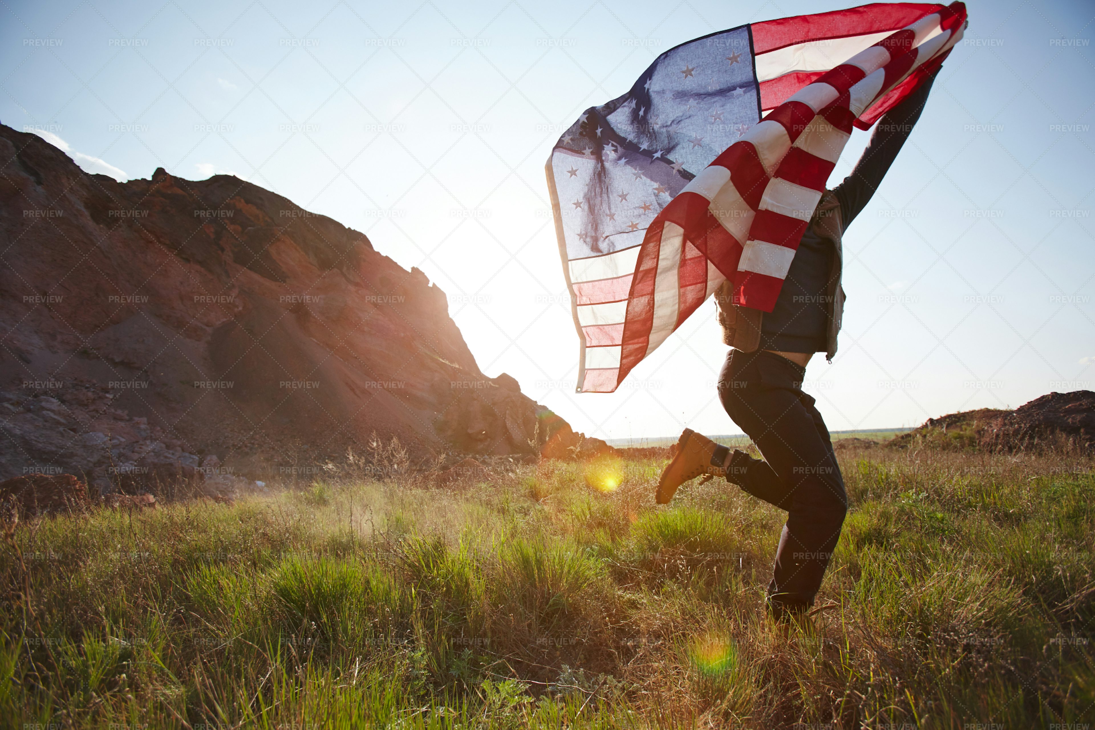 Joyful Man Running With USA Flag - Stock Photos | Motion Array