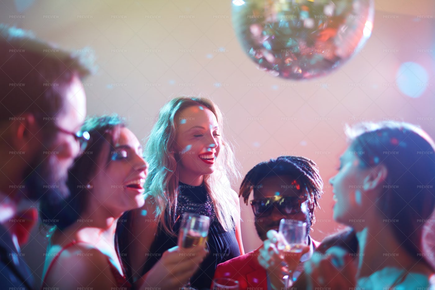 Celebrating Momentous Event In Nightclub - Stock Photos | Motion Array