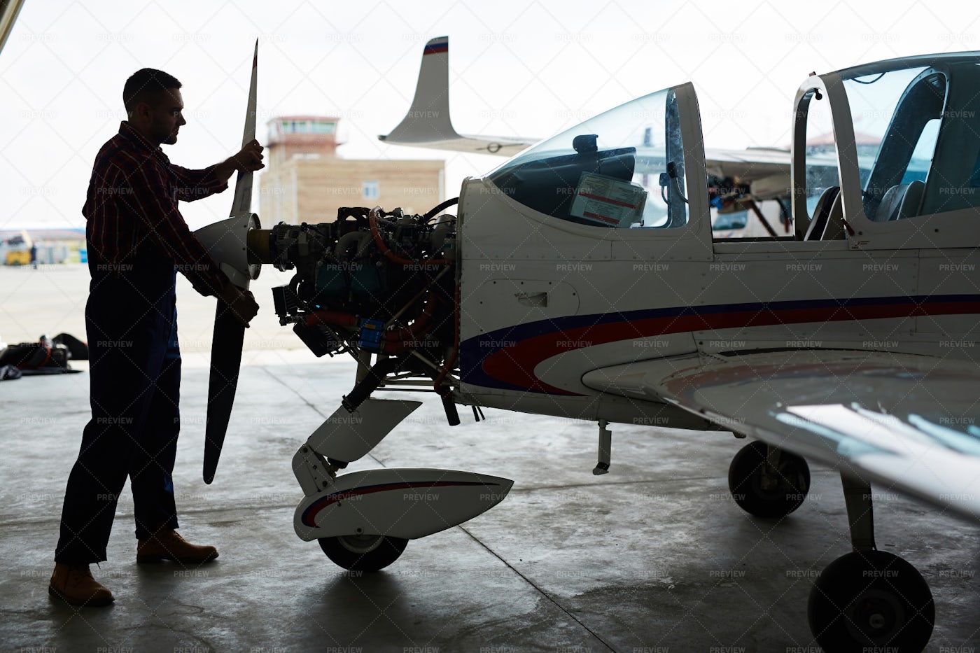 Mechanic Working With Airplane In Hangar Stock Photos Motion Array Mechanic Working With Airplane In Hangar Stock Photos Motion Array