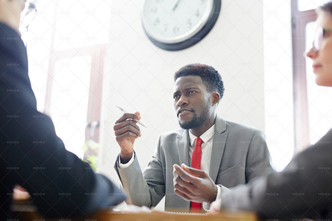 Discussing Strategies: Stock Photos