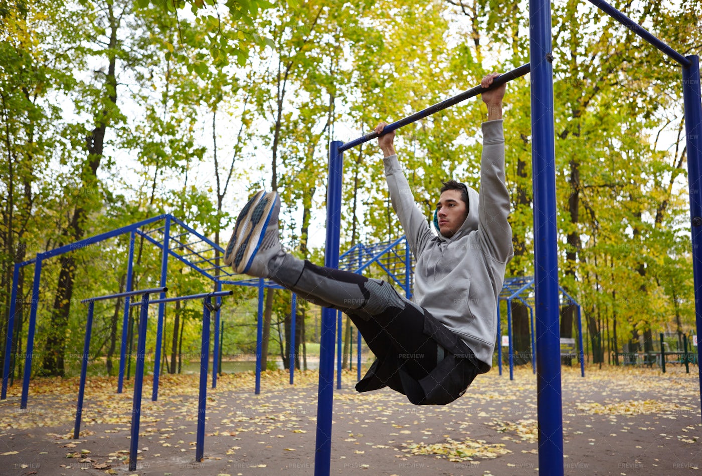 Doing Pull-ups On Horizontal Bar: Stock Photos