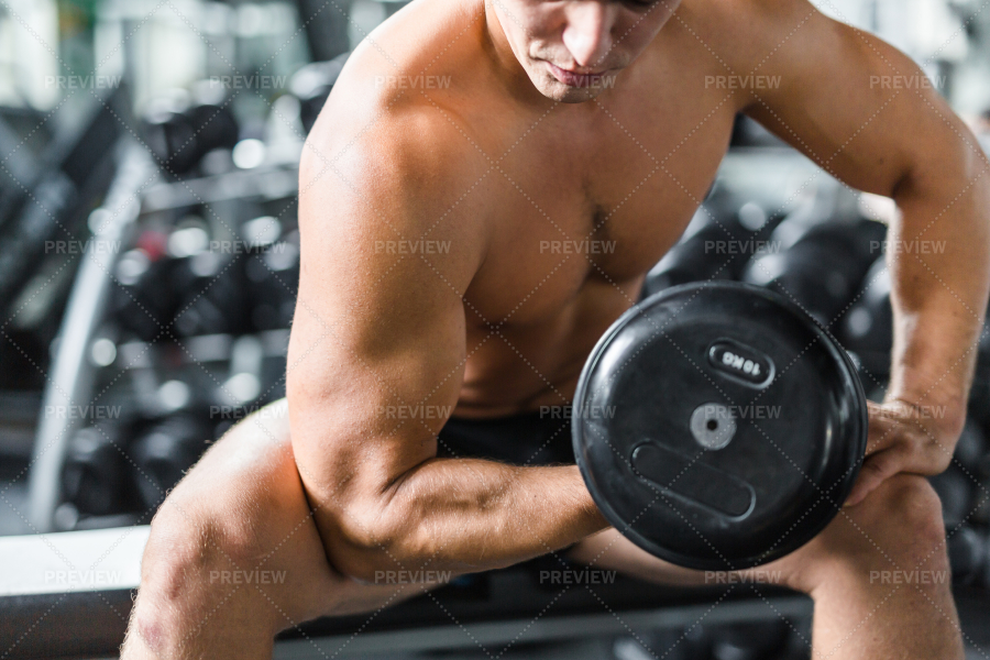 Flexing Arm Muscles In Strength Training - Stock Photos | Motion Array