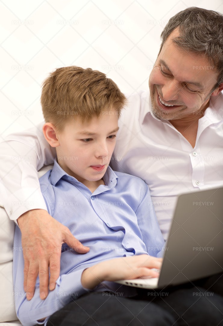 Son Working With Father: Stock Photos