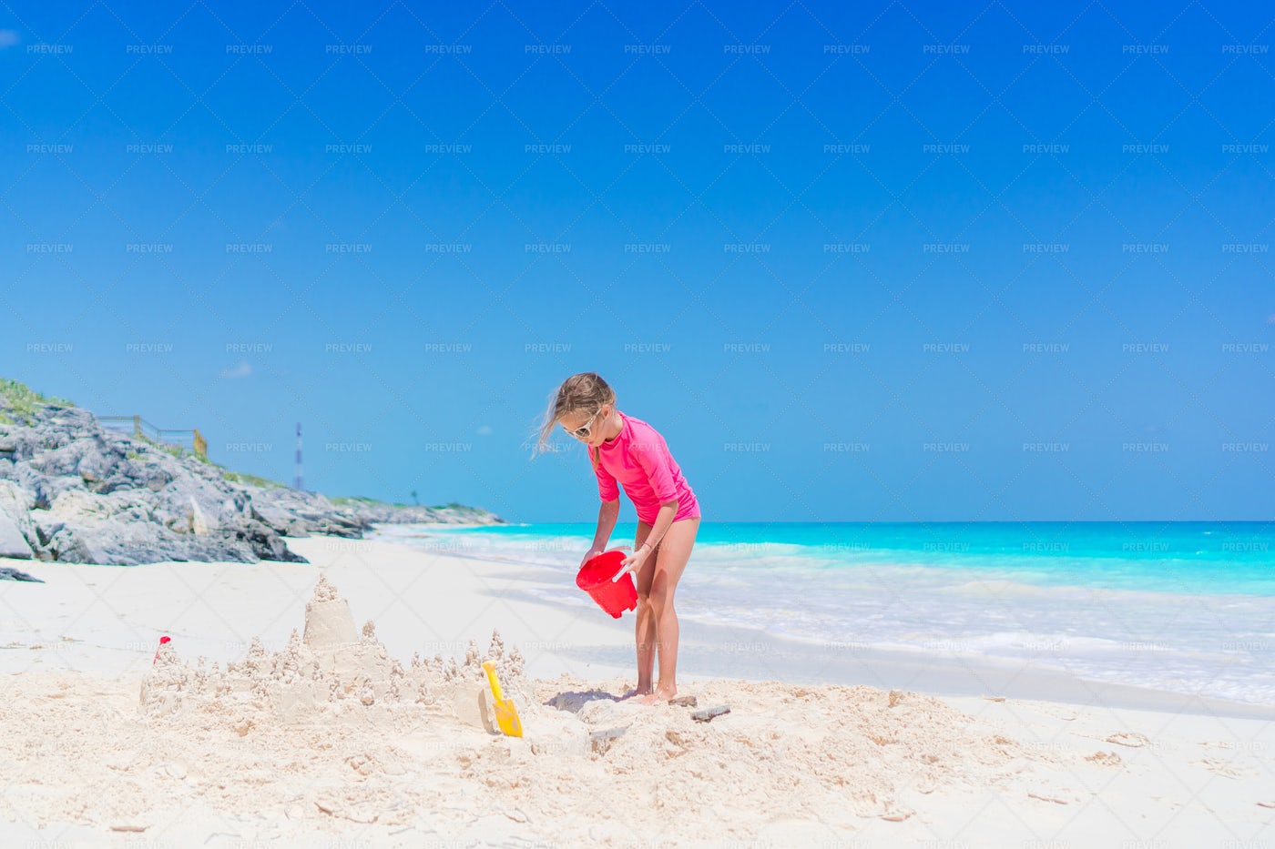 Building Sandcastle With Bucket: Stock Photos