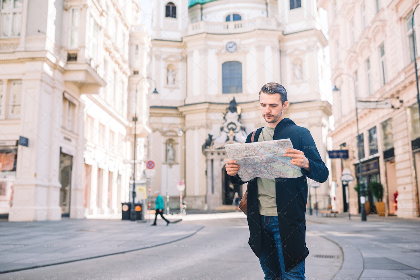 Tourist Man With A Map And Backpack: Stock Photos