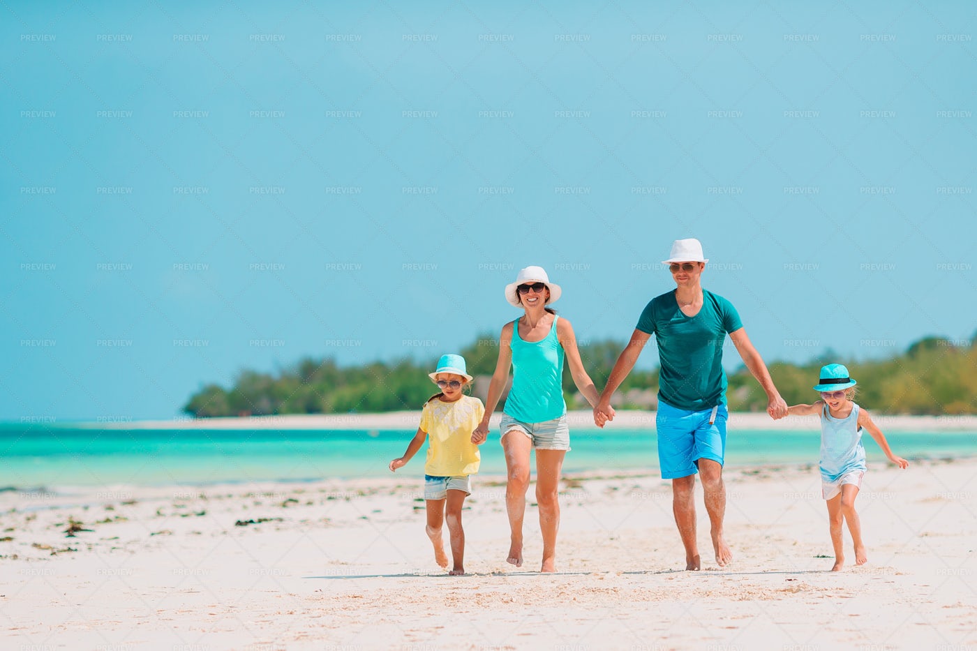 Family Runs On Beach: Stock Photos
