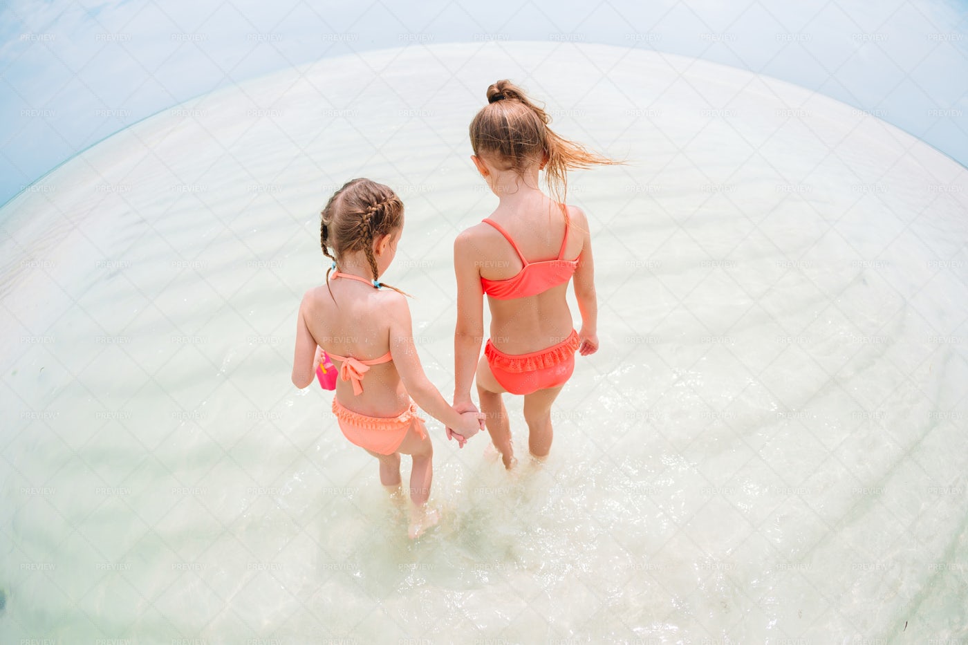 Sisters In The Ocean: Stock Photos
