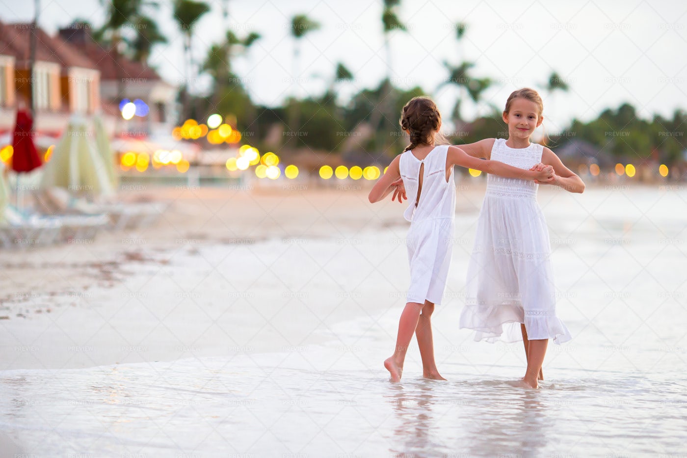 Children Dancing On A Beach: Stock Photos