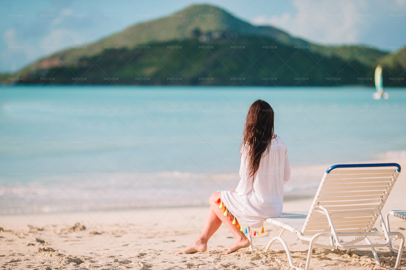 Woman Sitting On Beach Chair: Stock Photos