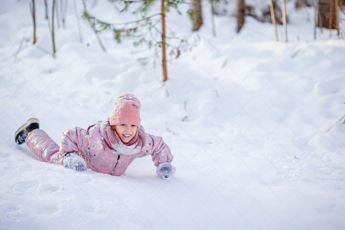 Child Fell On Icy Hill: Stock Photos