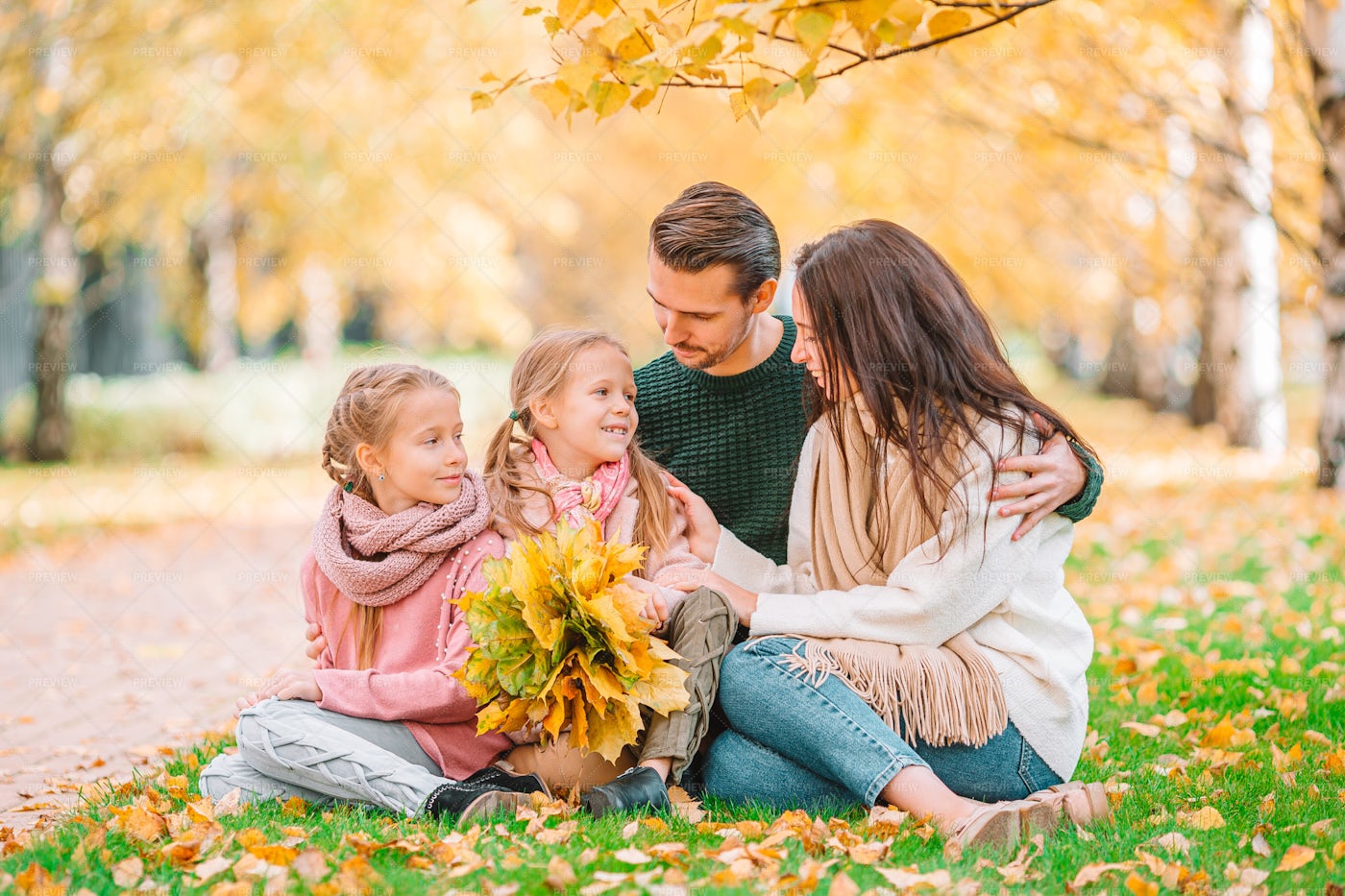 Family Of Four In Autumn Park: Stock Photos
