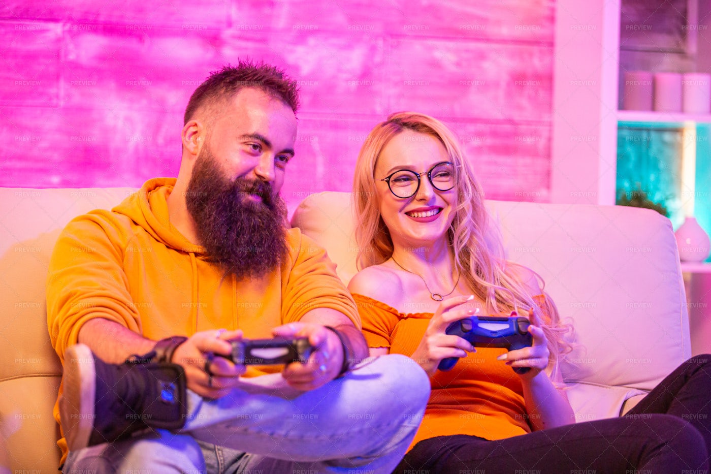 Gaming Couple On Couch: Stock Photos