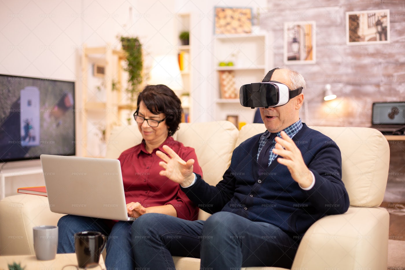 Old Couple Using Modern Technology: Stock Photos