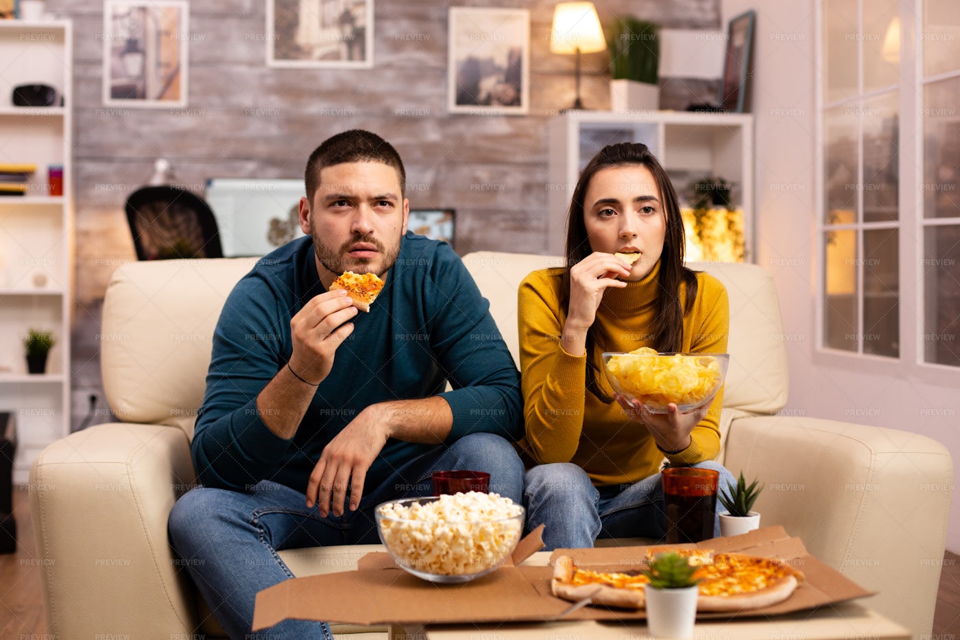 Young Couple Watching TV: Stock Photos