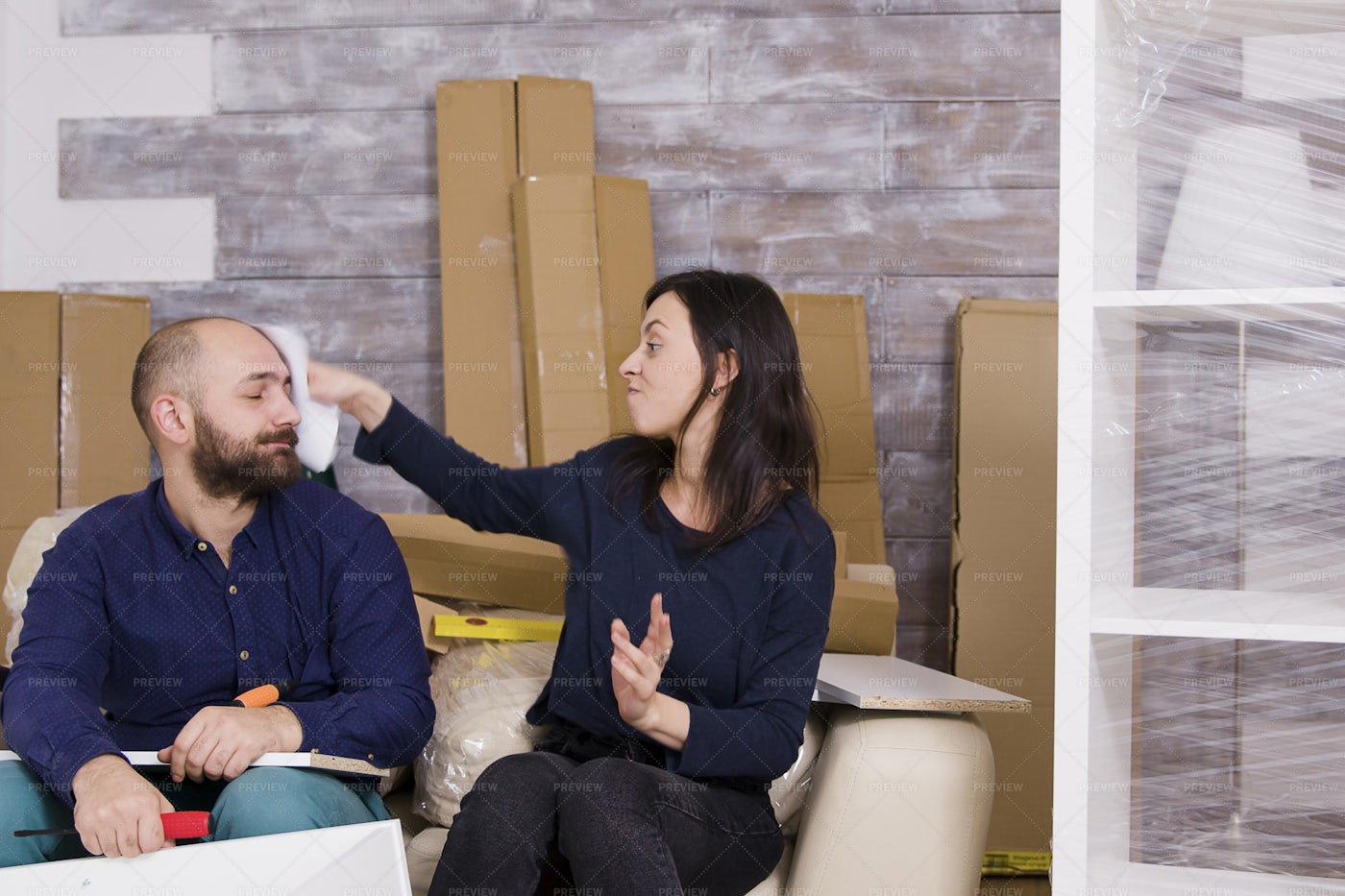 Smacking Partner With Paper: Stock Photos