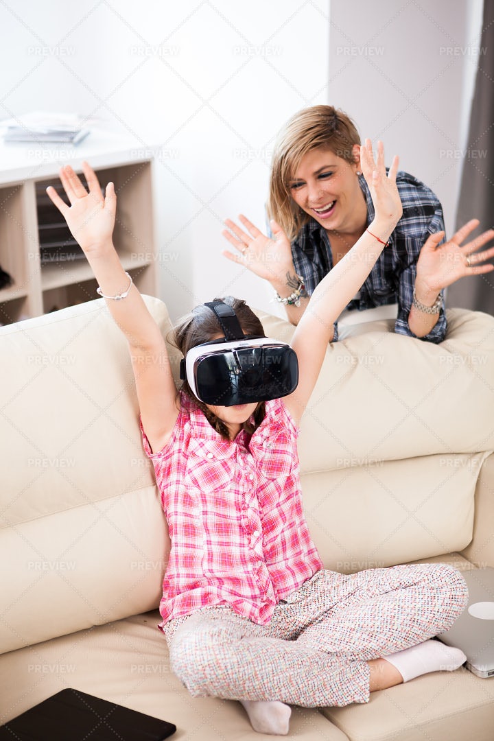 Raising Arms During Virtual Game: Stock Photos