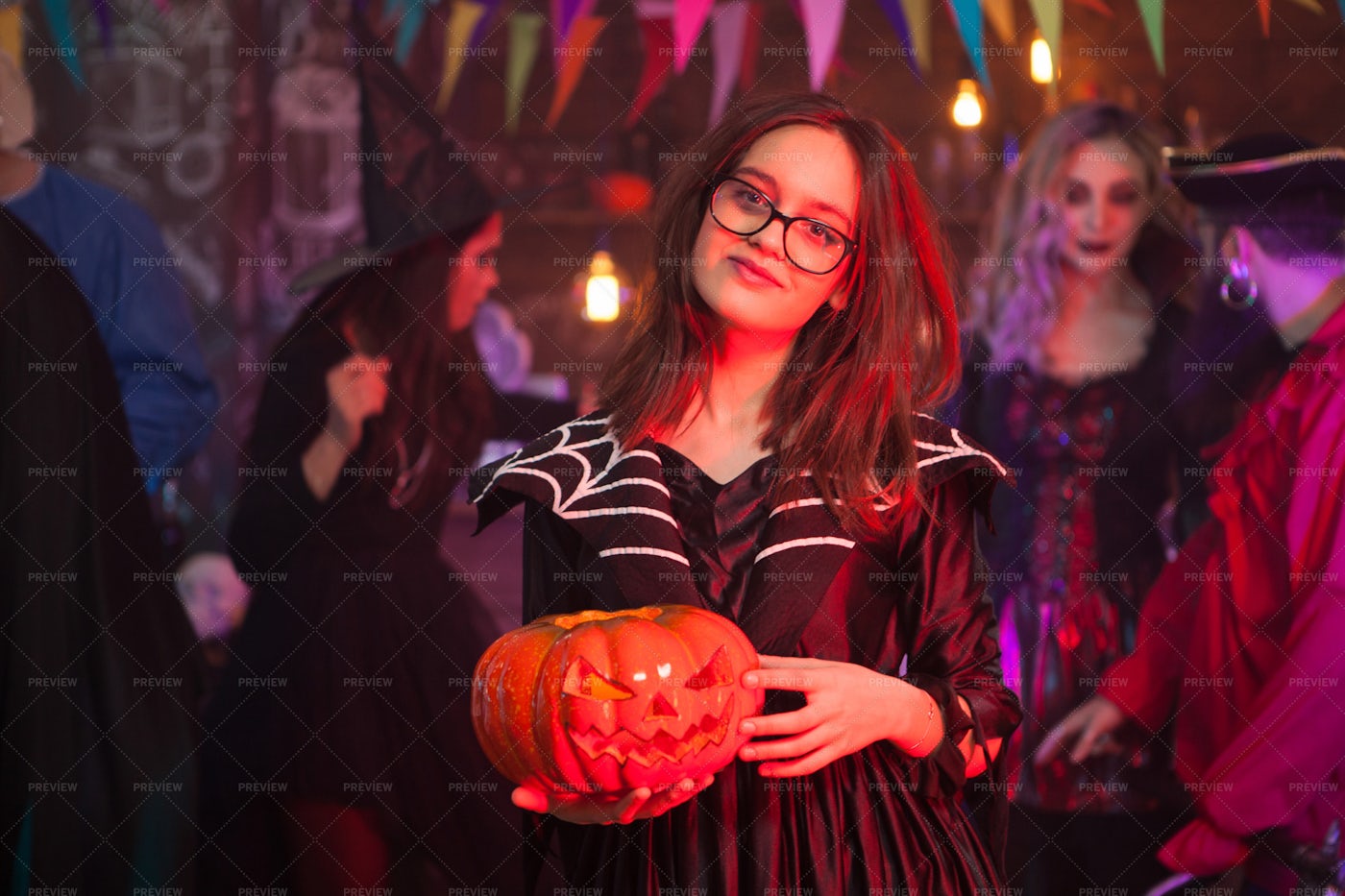 Pumpkin Between A Girl´s Hands: Stock Photos