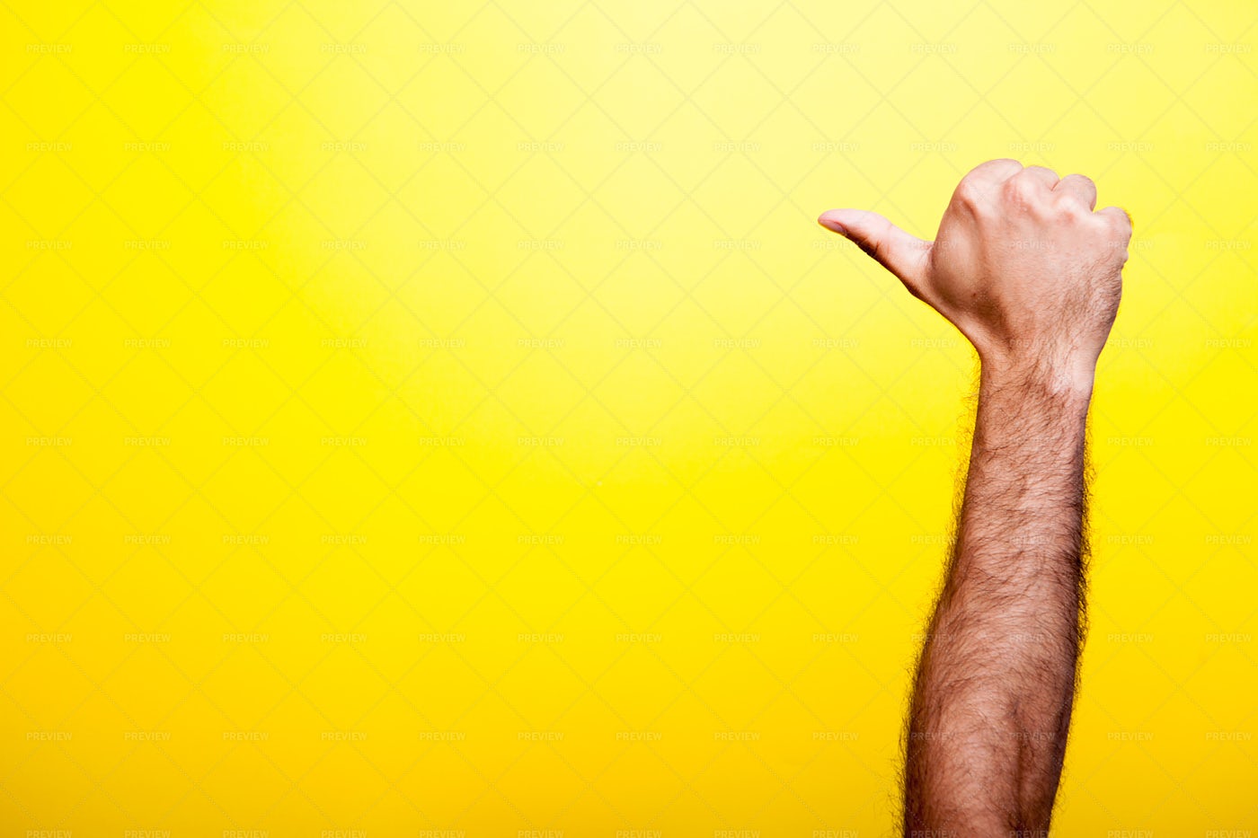 Male Hands Showing A Thumb Up Sign: Stock Photos