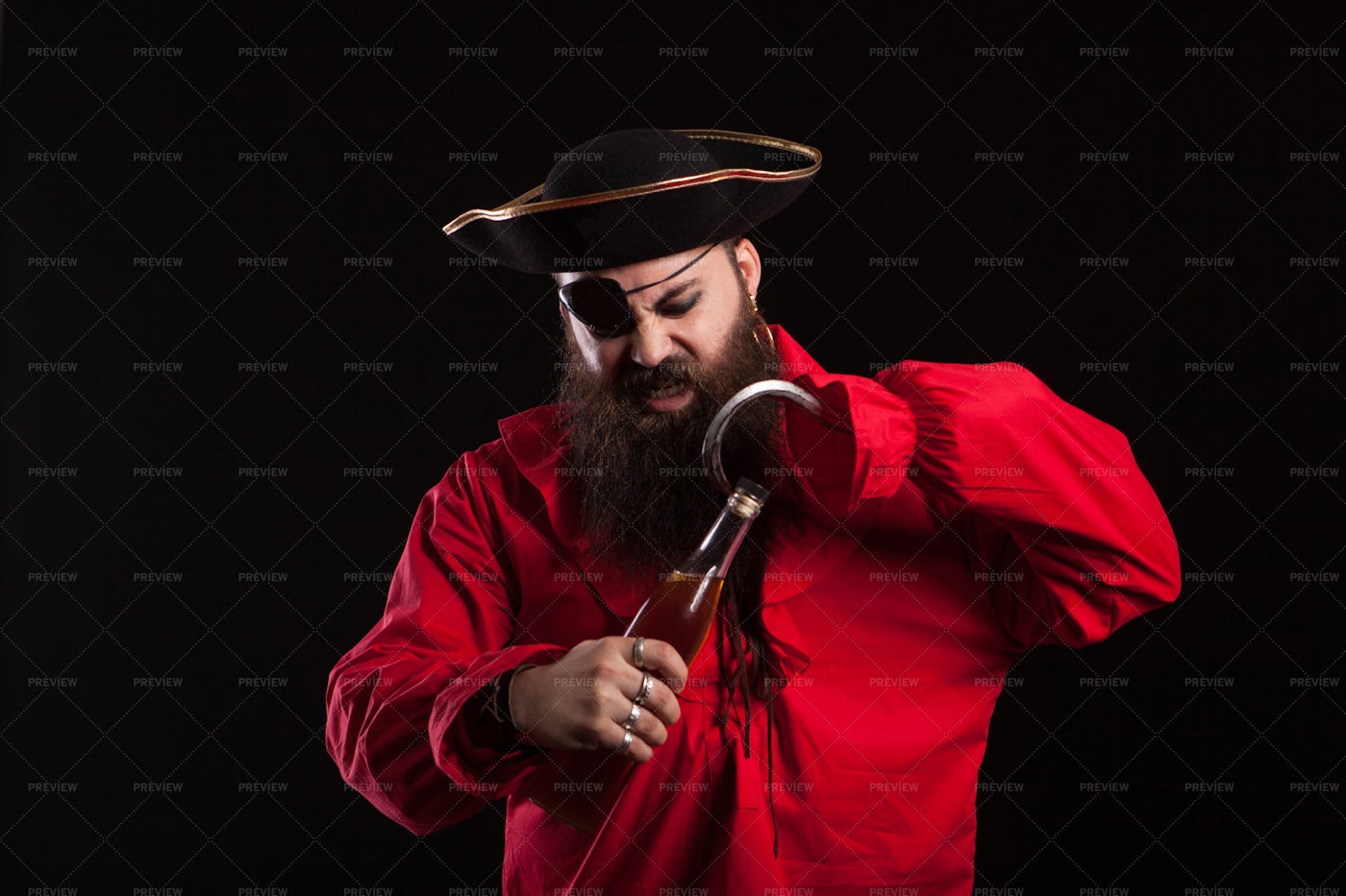 Pirate Opens Beer: Stock Photos