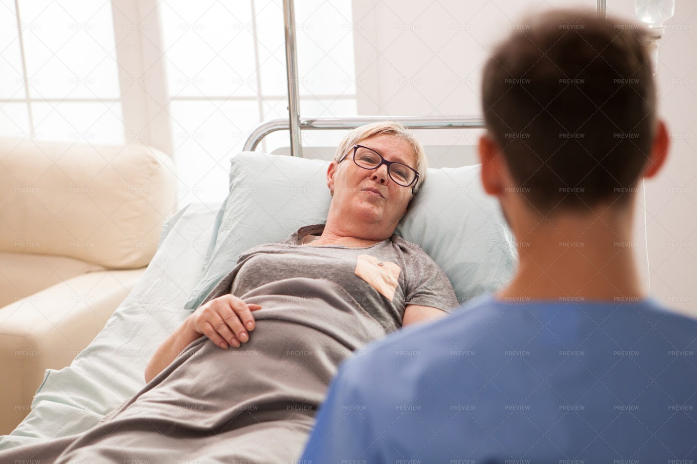 Paying Attention To Nurse: Stock Photos