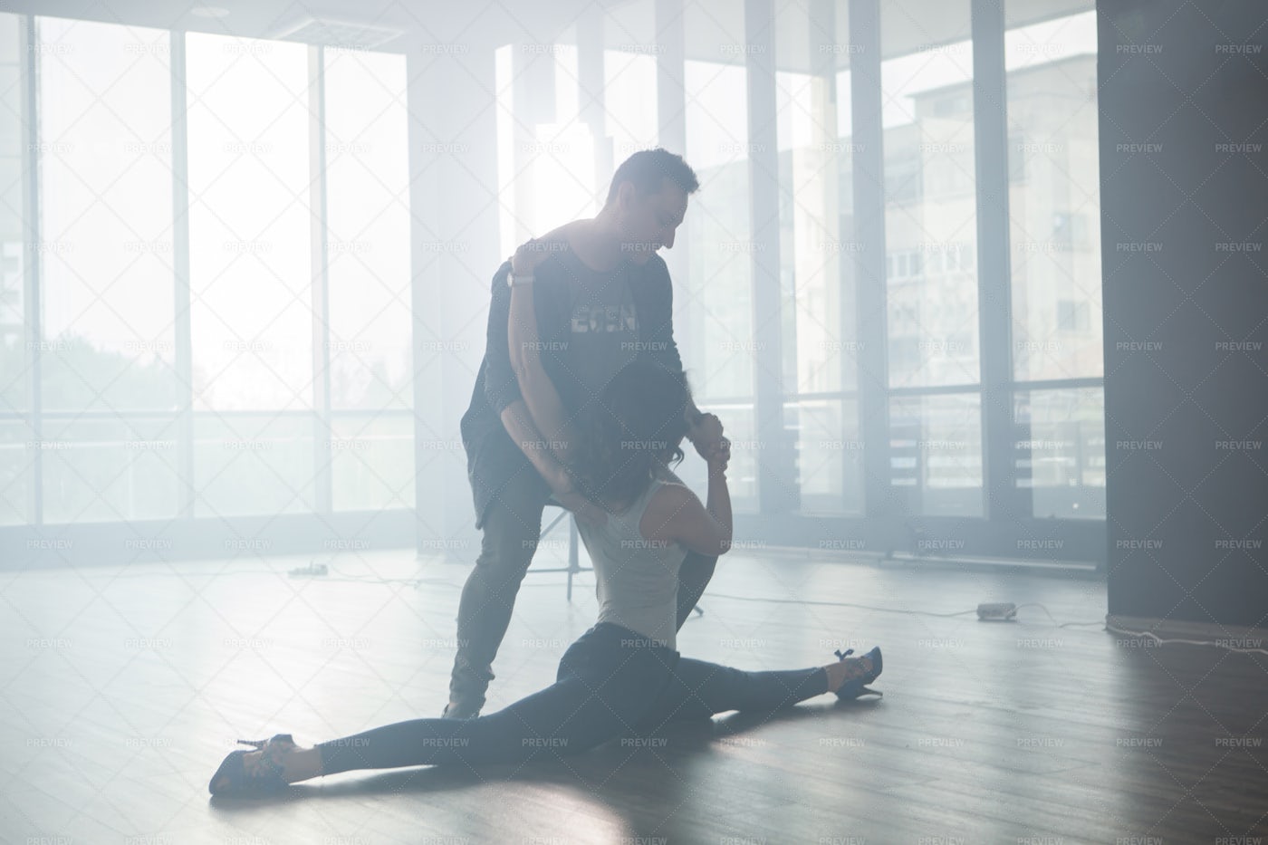 Dancers Practice Split Move: Stock Photos