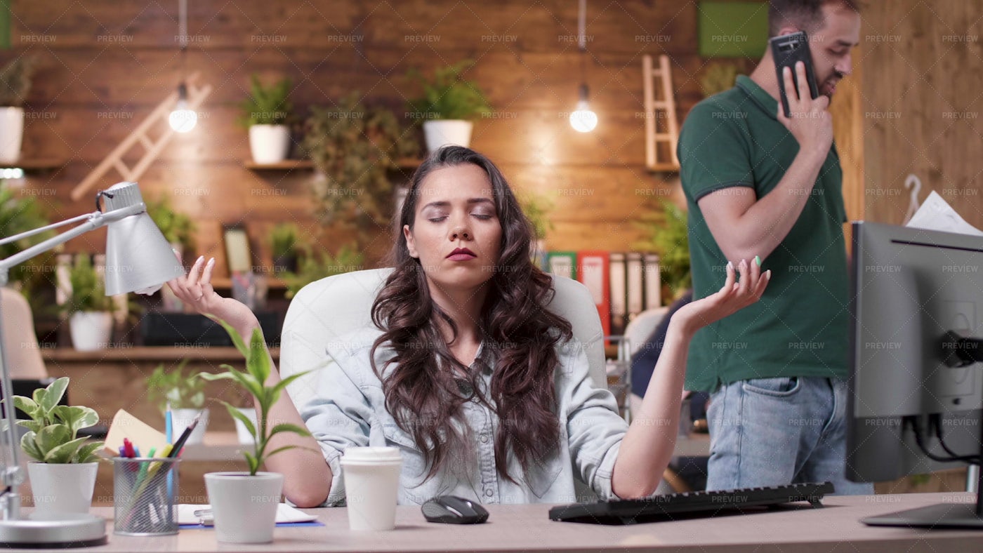 Meditating In Office: Stock Photos
