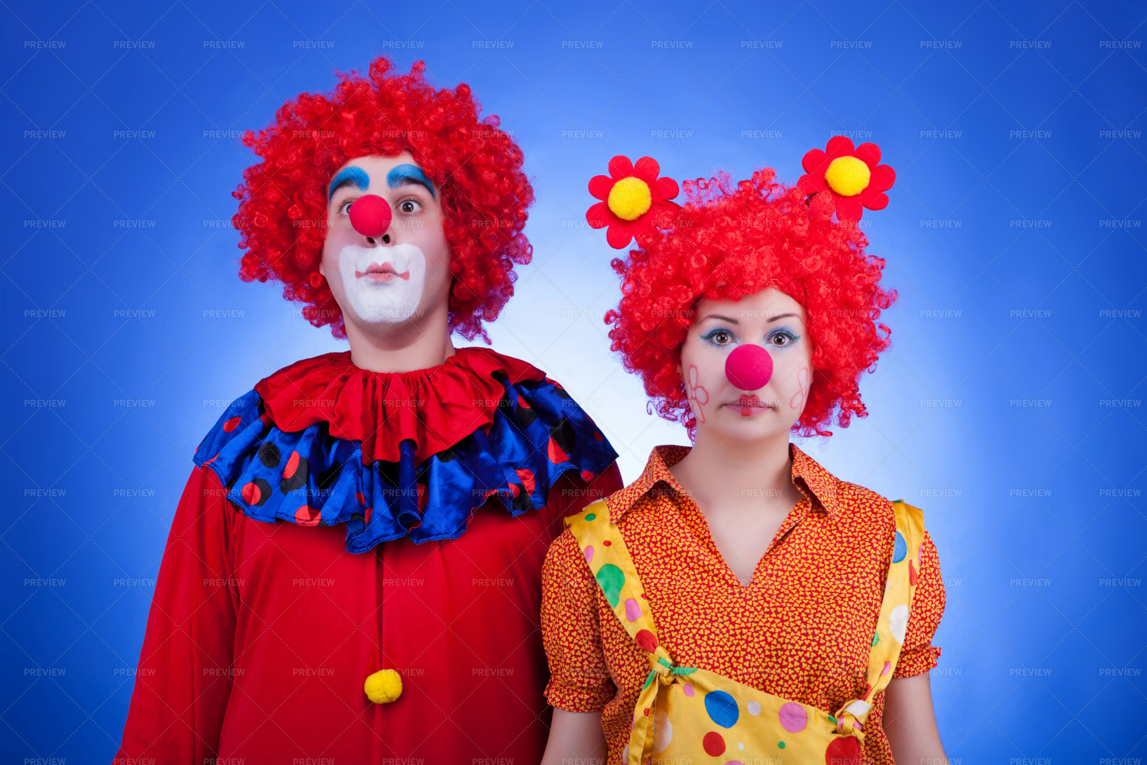 Clown Couple On Blue Background - Stock Photos | Motion Array