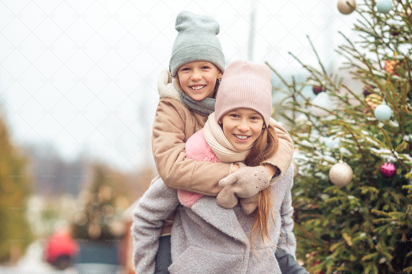Sister Gives Piggyback Ride: Stock Photos