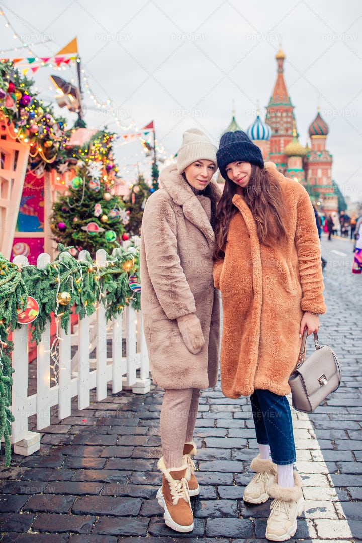 Two Women In A Christmas Street: Stock Photos