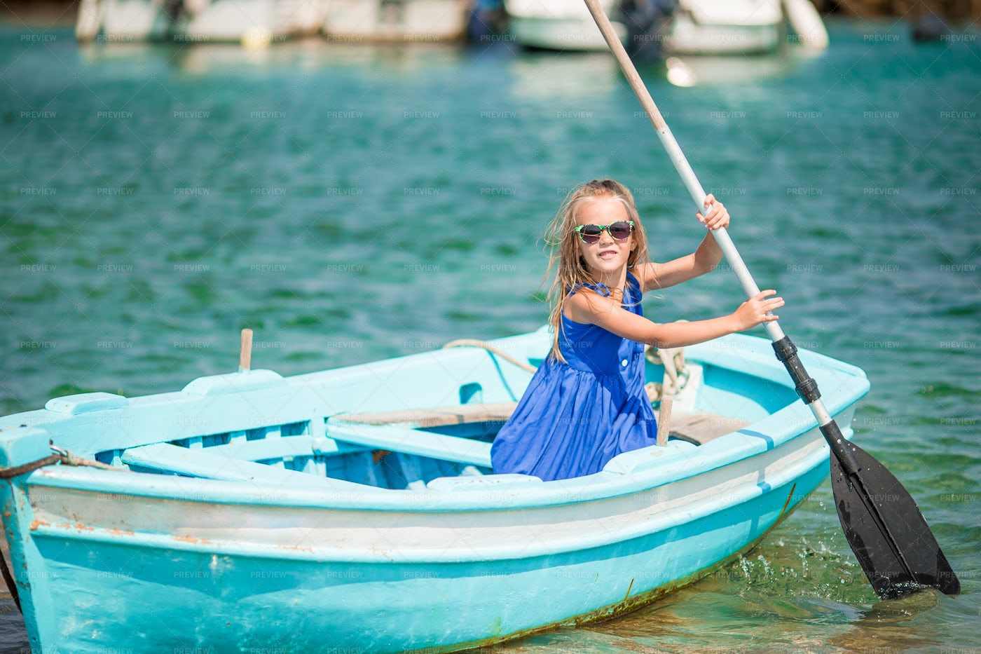 Girl In Rowboat: Stock Photos