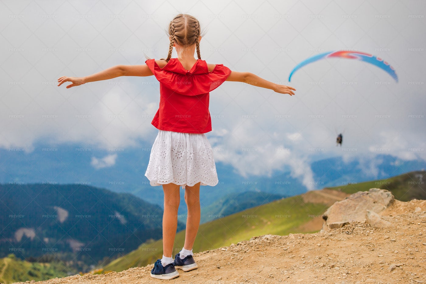 Little Girl Opening Her Arms: Stock Photos