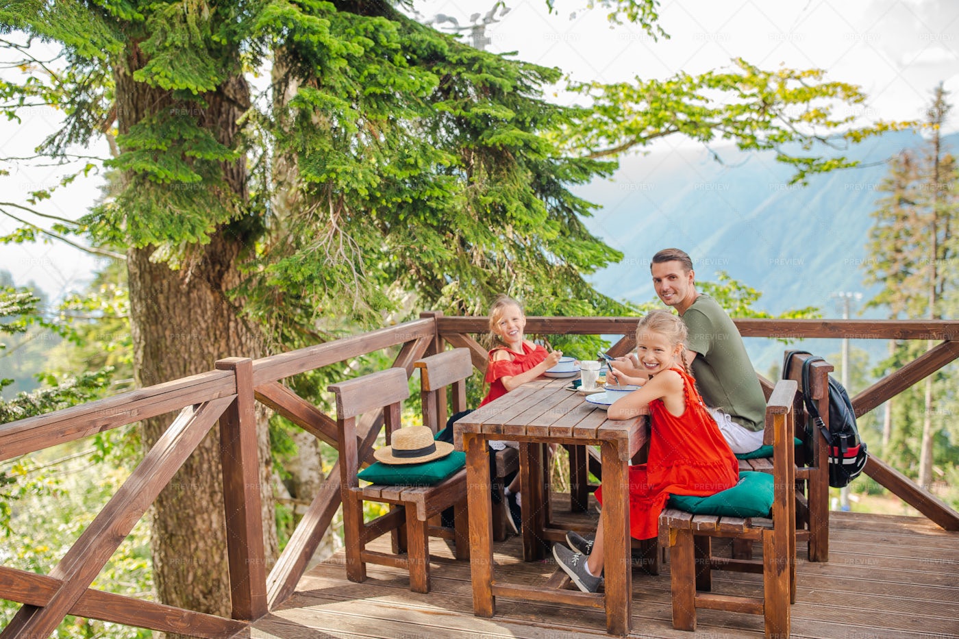 Happy Father And Kids In The Mountains: Stock Photos