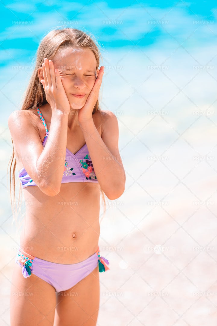 Sun Cream On The Face: Stock Photos