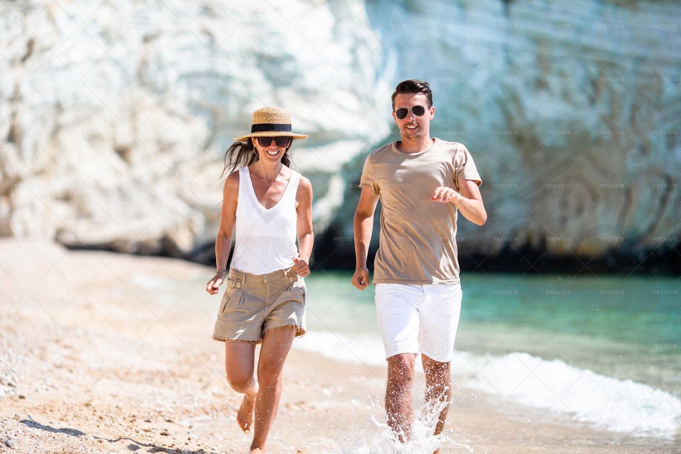 Running In The Shallow Water: Stock Photos