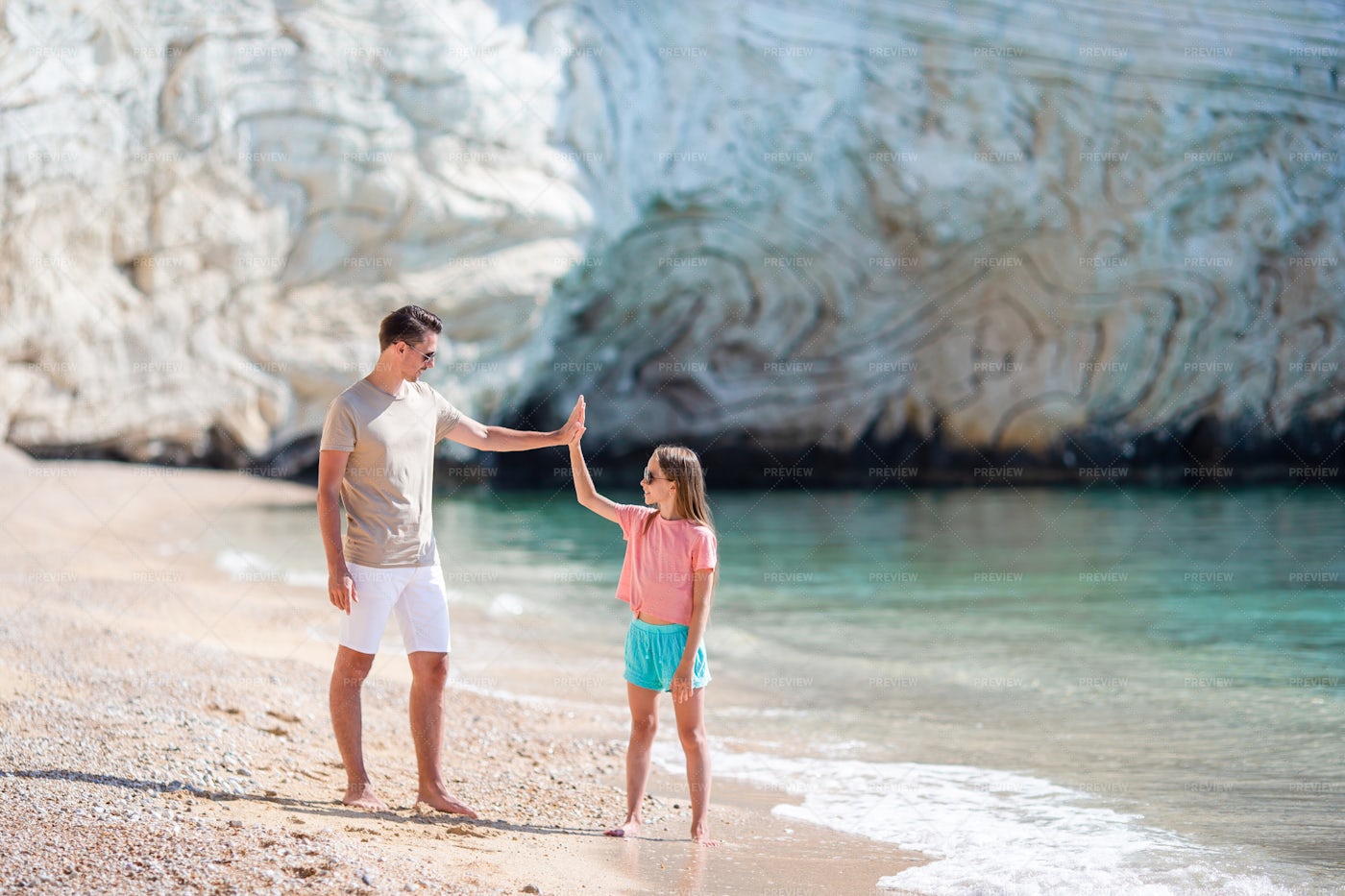Beach High Five: Stock Photos