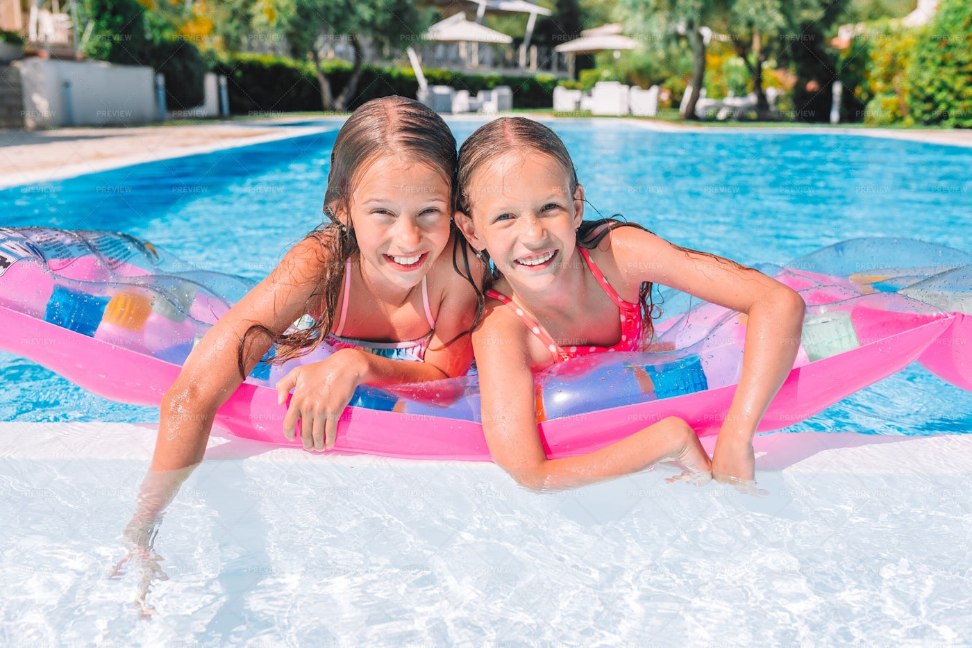 Sisters In The Pool Together: Stock Photos