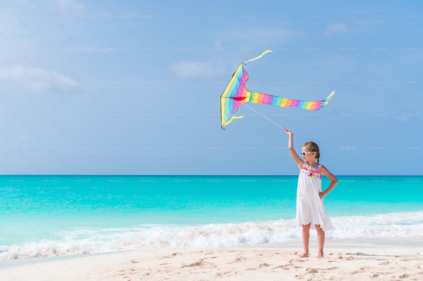 Kid Flies Colorful Kite: Stock Photos