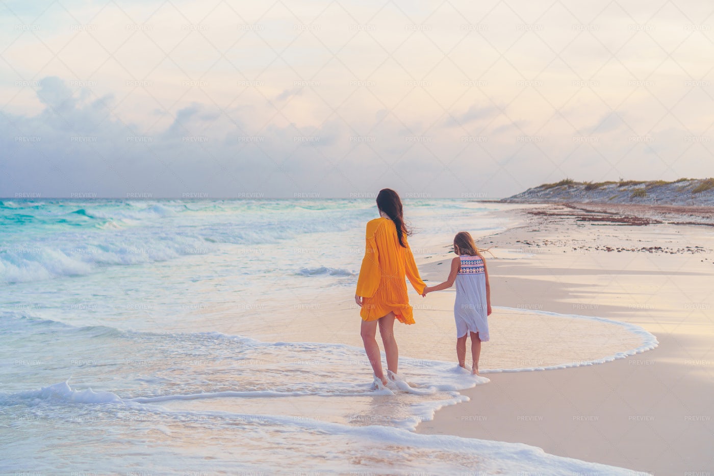 Walking On Beach With Mom: Stock Photos