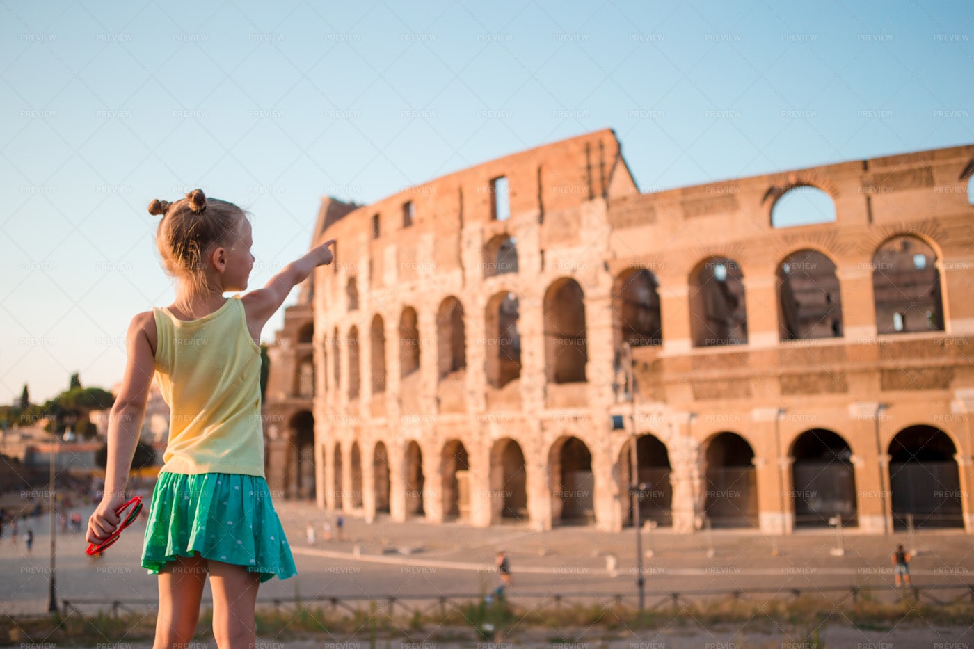 Young Girl In Front Of Colosseum: Stock Photos