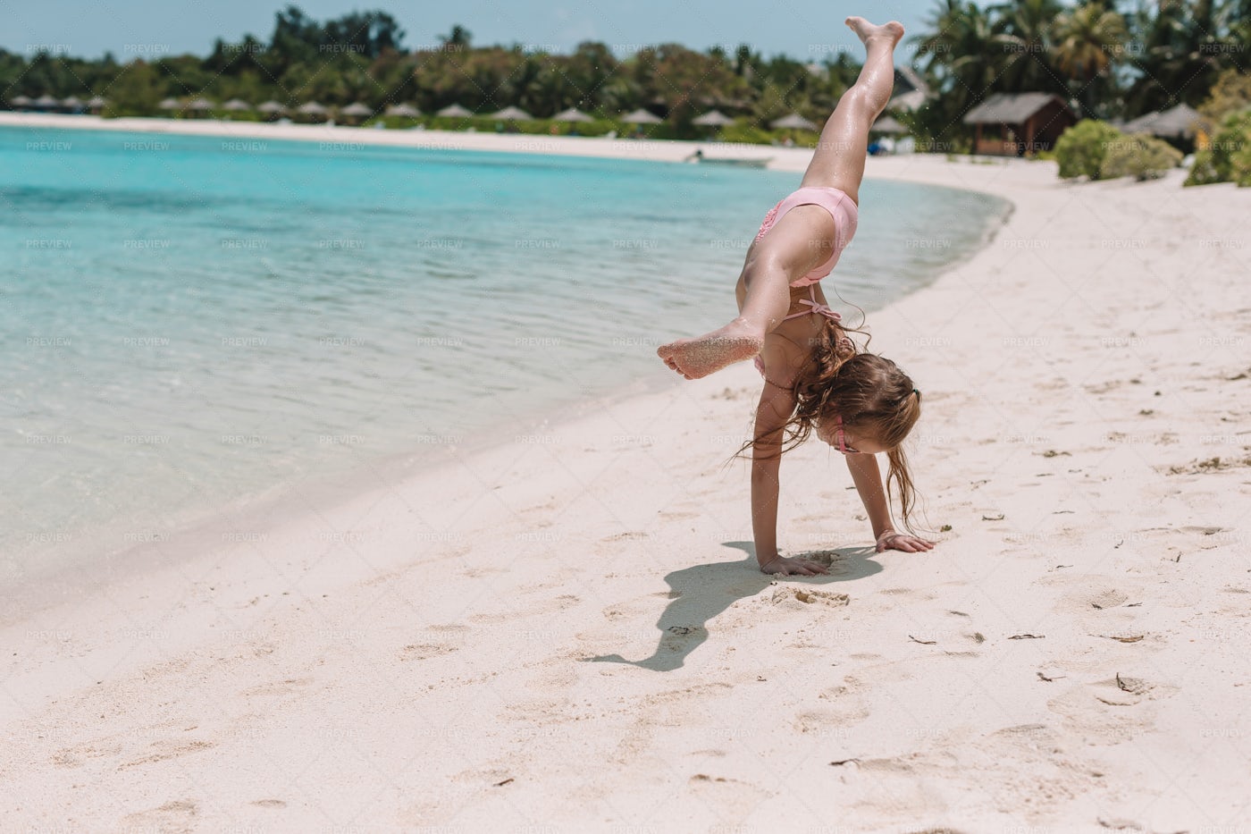 Somersaults On The Beach: Stock Photos